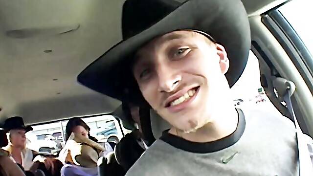 Jordan Styles gives a barefoot footjob in a straw hat