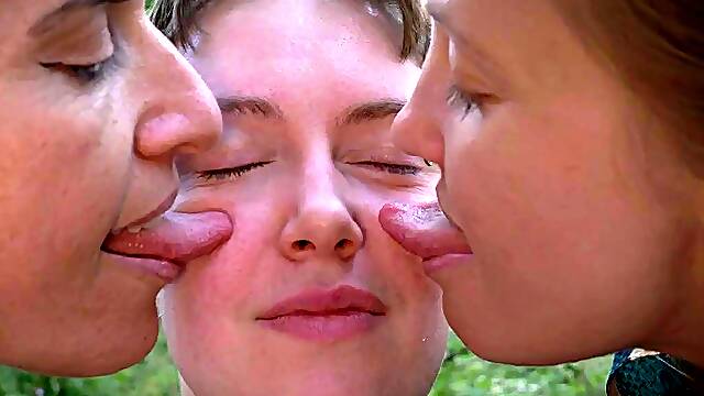 Wet licking and kissing session in outdoor lesbian threesome