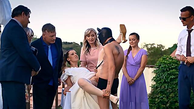 Andrea and her masked groom fucked outdoors on their wedding day